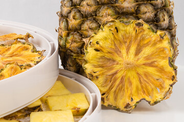dry and fresh pineapple background close-up