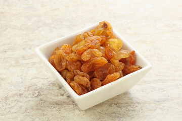 Sweet yellow raisin in the bowl