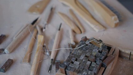 tools of craftsman, artist or sculptor in workshop, pottery studio