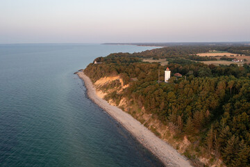 Gilleleje, Denmark - July 23, 2021: Aerial drone view of Nakkehoved Lighthouse in North Zealand - obrazy, fototapety, plakaty