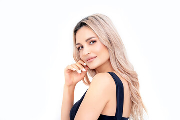 Naklejka premium Portrait of a beautiful blonde woman with natural makeup on a white background. Studio shot.