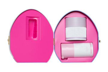 Closeup of an opened decorative cosmetic box or gift box with label-free pink white containers...