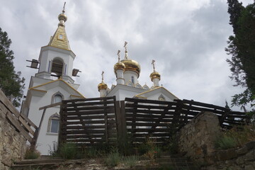 Church behind a wooden fence