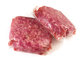 Beef Meat Patties in Vacuum Bags isolated on white Background