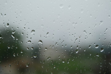 rain drops on glass window background wallpaper 