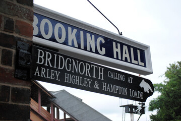 Obraz premium Close Up of Old Railway Station Signs 'Booking Hall' 