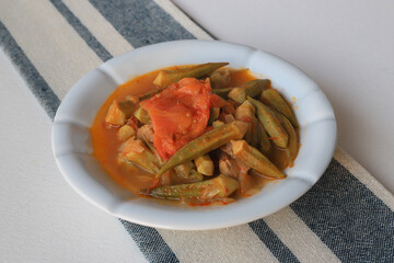 Bamya, Turkish traditional food. (Turkish cuisine) Homemade Food Okra in Plate. Organic Food.