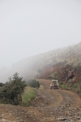 Scenic picture of 4x4 driving on the Sani Mountain Pass in South Africa