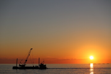 Obraz premium boat at sunset
