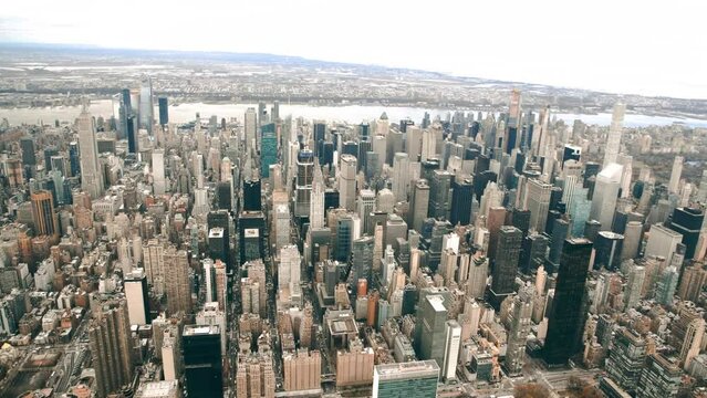 Aerial view of Midtown Manhattan from helicopter in slow motion, New York City