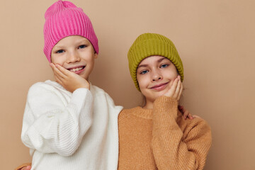 smiling little girls in hats studio childhood