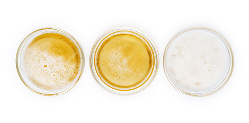Set of beer in glass. beer bubbles and beer foam in glass on white background. top view collection isolated on white background.