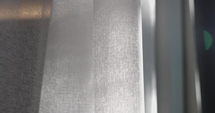 4K video slow motion of curtain in the wind. Concept for cozy and modern residential house.