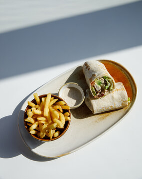 Breakfast wrap with chicken and avocado fillings