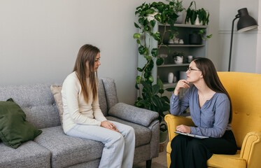 a woman psychologist conducts an appointment for a frustrated woman patient. Psychological problems. Professional psychological assistance