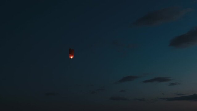 Chinese Lantern flying in the blue sky 
