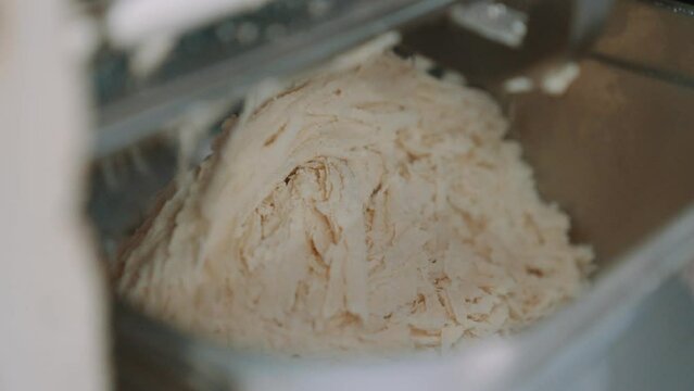 Slow Motion of Finely Grounded Almond Flour Food Processor, Grinding Almonds for Making Marzipan