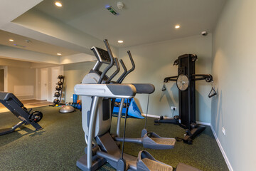 Interior of an empty hotel gym with equipment