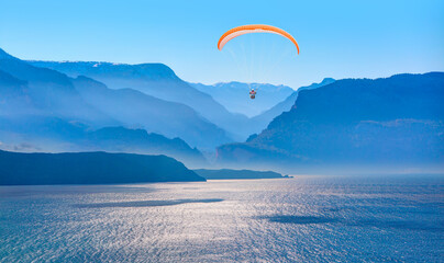 Paraglider flies in the sky - Oludeniz, Fethiye