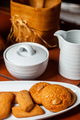 A platter with dry cakes, on the counter of a traditional bakery.