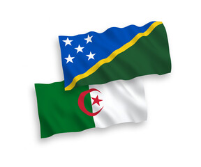 Fototapeta premium National vector fabric wave flags of Solomon Islands and Algeria isolated on white background. 1 to 2 proportion.