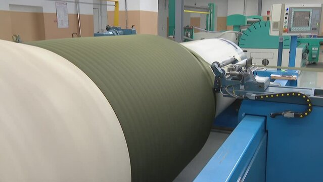 Factory for the production of fabrics and threads for sewing.