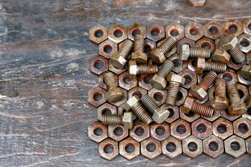 Rusty nuts and bolts. Dirty. Vintage. Old. Rusty metal pieces that fit together. Objects to make...