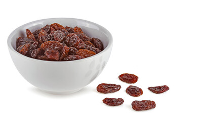 Dried raisins in bowl isolated on white background