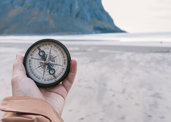 compass on the beach in norway