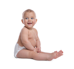 Cute baby in dry soft diaper sitting on white background