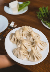 A dish of khinkali, a traditional georgian dumpling with minced meat