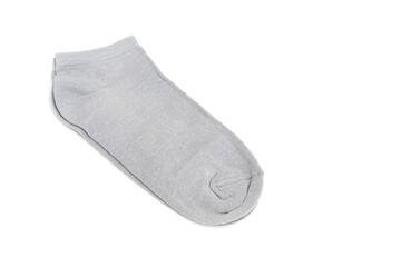 A pair of short gray socks on a white background. accessories for men and women. clothing store.