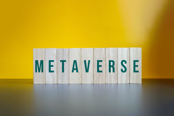 Metaverse, Wood Blocks on Yellow Background.