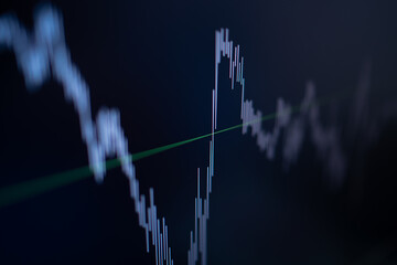 Stockmarket online trading chart bars on crypto currency platform. Stock exchange financial market price candles graph data pattern analysis concept. Computer screen closeup. blurred foreground.