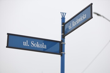 sign on the street, made of metal, sign, streets, direction street