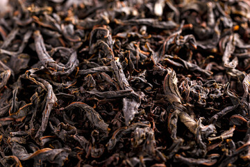 Dry Black large leaf tea. Background, texture
