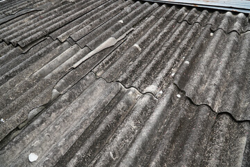 Dangerous asbestos, eternit as building material for roof and wall cladding. In many countries, this material is banned due to the cancer risk posed by microfibers. Roof covering favela Rio de Janeiro