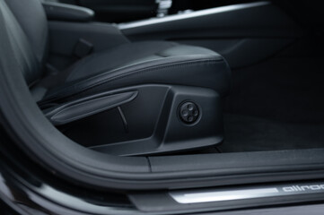 Fototapeta na wymiar seat control buttons in the car interior