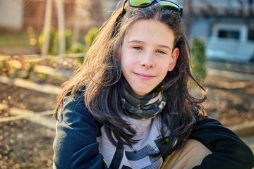 Portrait of a smiling teenager looking at the camera and smiling  