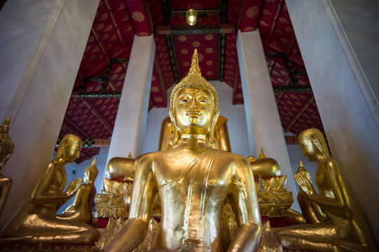 Golden Buddha Statue at Wat Arun Temple in Bangkok, Thailand