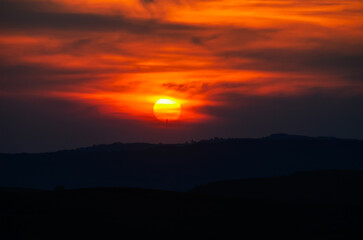 Amazing and dramatic red and orange sunset sky. Beautiful color nature landscape.
