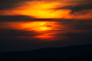 Amazing and dramatic red and orange sunset sky. Beautiful color nature landscape.