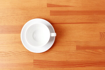 cup of coffee on wooden table