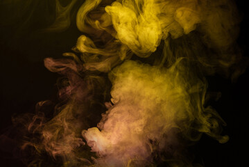 Yellow and pink steam on a black background.