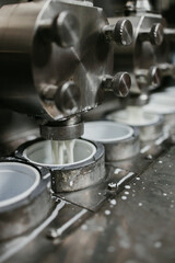 Factory production line for different dairy products such a sour cream or sour milk manufacturing.
