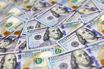 US dollars banknotes, paper currency for background, selective focus. Concept of american and global economy, exchange rate