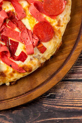 Assorted handmade Argentinian pizza on stone background.