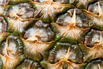 Pineapple skin texture. Close up of pineapple texture background. Fruit food background