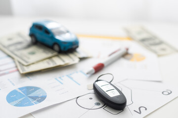 Fototapeta premium document - buying a car with euro, pen, calculator and toy car.