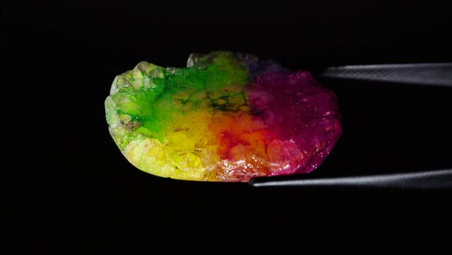 natural multi colored quartz gem stone on the turning table